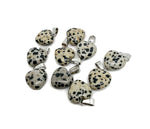 Dalmatian Jasper heart-shaped pendant from GemstoneGO featuring a mini crystal design, showcasing black and cream spotted gemstone.