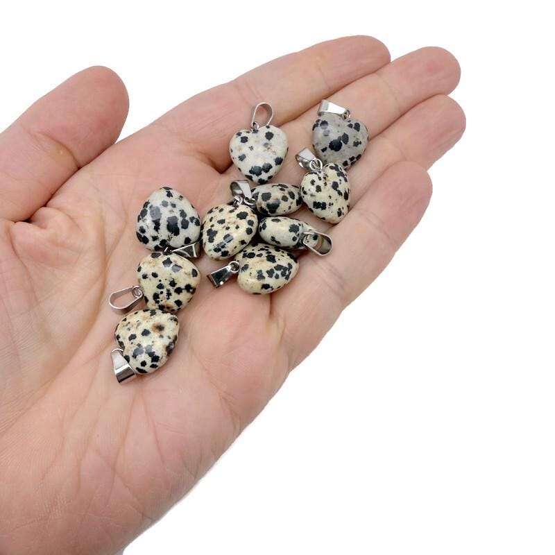Dalmatian Jasper heart pendant with mini crystal accent, gemstone jewelry by GemstoneGO, showcasing a polished stone and delicate design.