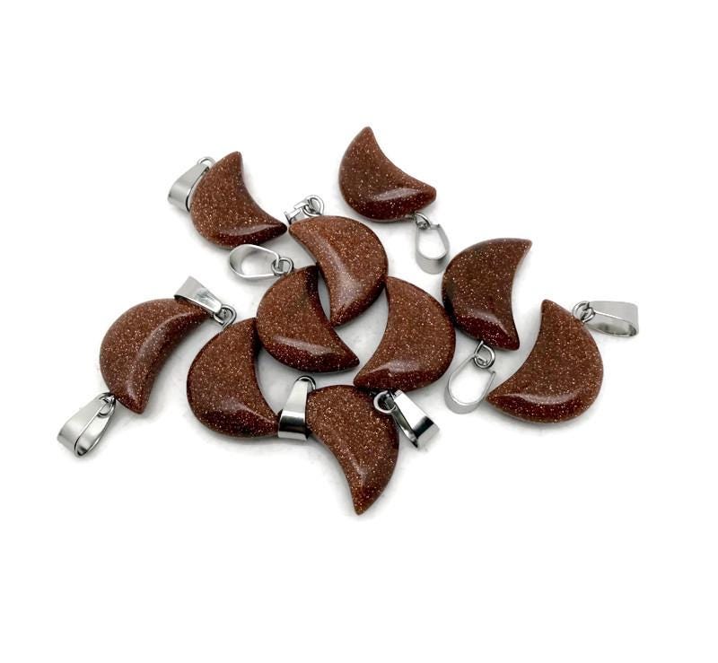 Goldstone moon pendant and matching moon earrings with crystal accents, ideal for jewelry making and healing jewelry designs.