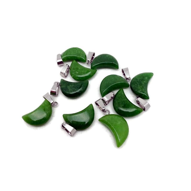 Green jade moon crystal pendant from GemstoneGO, showcasing a polished green jade moon-shaped pendant for jewelry making.