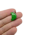 Green jade moon crystal pendant from GemstoneGO, showcasing a polished jade gemstone shaped like a moon, ideal for jewelry making.