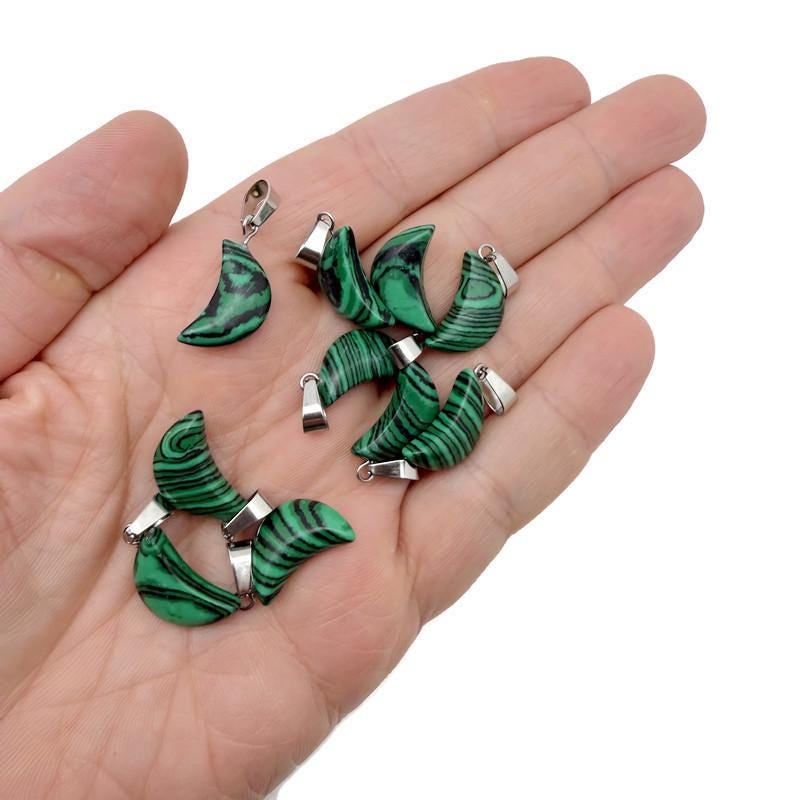 Malachite Moon synthetic pendant from GemstoneGO, showcasing a vibrant green gemstone with a moon shape, jewelry making supply.