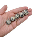 Dalmatian Jasper apple-shaped crystal pendant with mini size from GemstoneGO, featuring black spots on a creamy background.