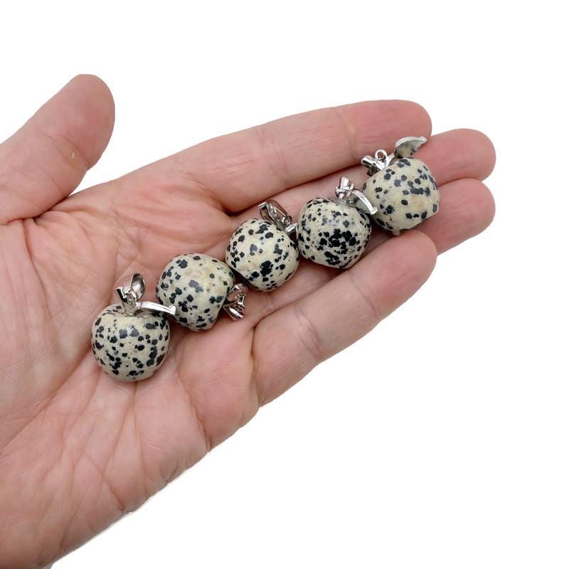 Dalmatian Jasper apple-shaped crystal pendant with mini size from GemstoneGO, featuring black spots on a creamy background.