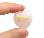 Rose Quartz heart engraved crystal by GemstoneGO, showcasing a polished pink gemstone with engraved symbols representing love and peace.