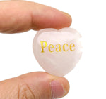Rose Quartz Heart engraved crystal by GemstoneGO with symbols for love, trust, strength, kindness, peace, and happiness.