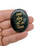 Engraved crystal paperweight with "One Day at a Time" inspirational message, featuring a clear, faceted design by GemstoneGO.