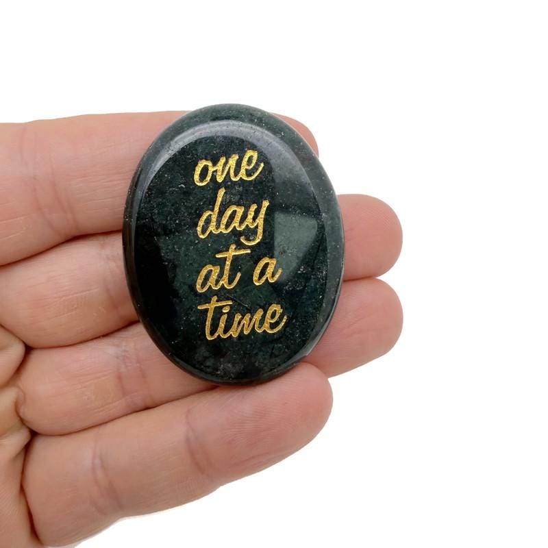 Engraved crystal paperweight with "One Day at a Time" inspirational message, featuring a clear, faceted design by GemstoneGO.