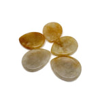 Yellow jade worry stone from GemstoneGO, 45mm soothing crystal with polished smooth surface and natural yellow color.