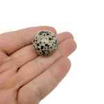 25mm natural crystal sphere from GemstoneGO, showcasing a clear, polished gemstone ball on a plain background.