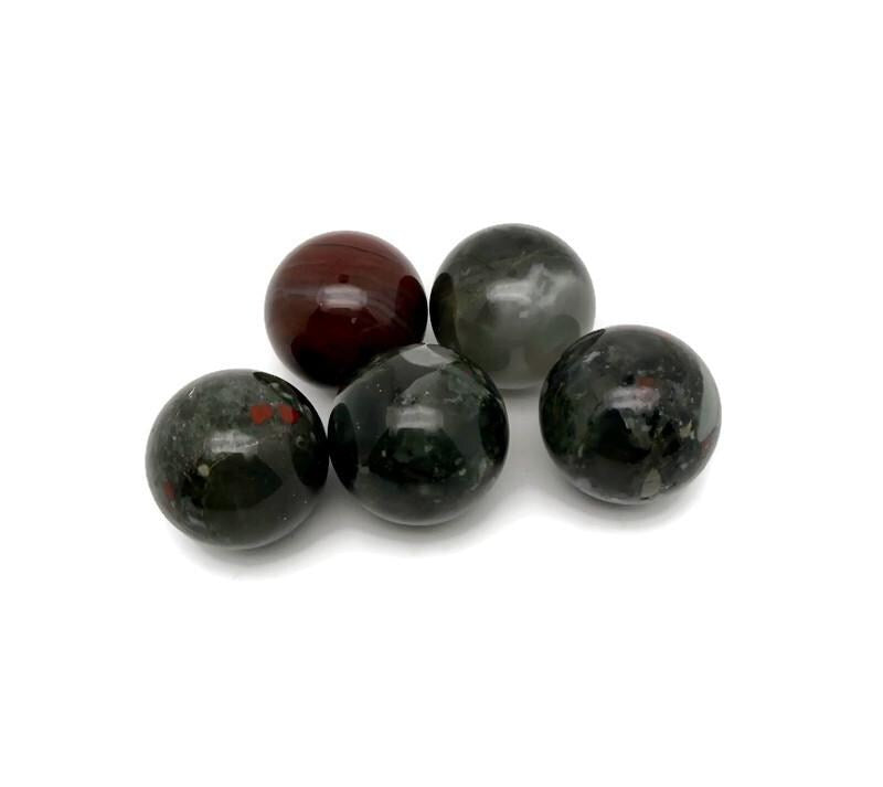 African Bloodstone sphere, 25mm crystal ball from GemstoneGO showing deep green stone with red bloodstone inclusions.