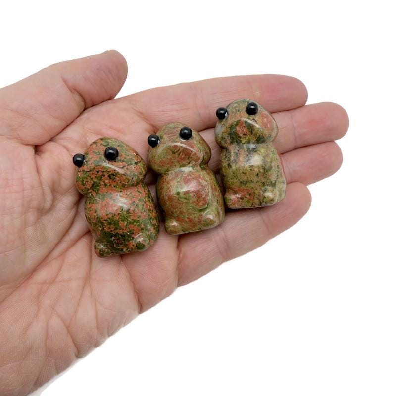 Handcrafted Unakite frog gemstone carving featuring vibrant green and pink hues, detailed creature statue from GemstoneGO.
