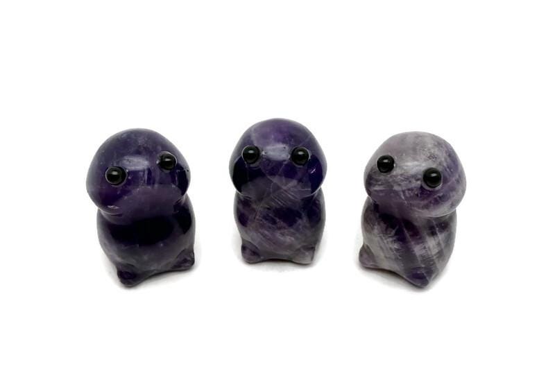 Handcrafted amethyst frog monster crystal carving by GemstoneGO, featuring a detailed gemstone creature statue.