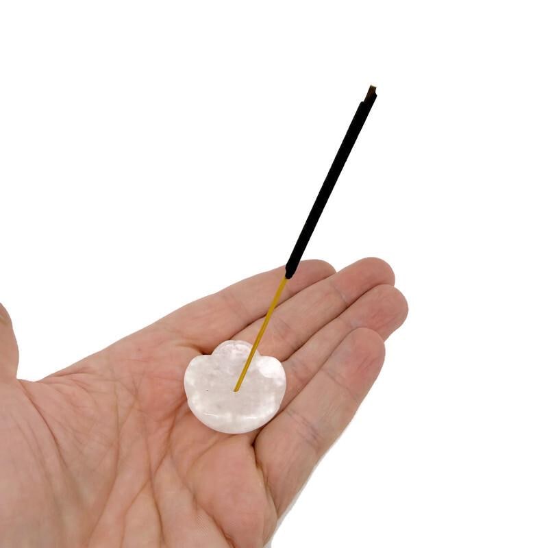 Crystal carving incense holder shaped like a flower, designed for burning incense sticks and promoting relaxation and cleansing.