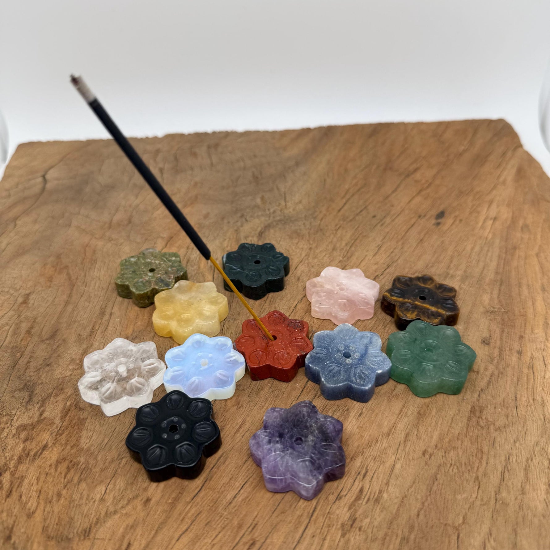 Natural crystal flower incense holder from GemstoneGO, carved gemstone stick burner for meditation, featuring a floral design and gemstone material.
