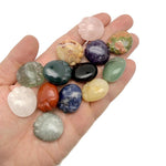 Handmade carved crystal cat paw animal figure, 25mm, in mixed gemstones, showcasing intricate craftsmanship and vibrant mineral colors.