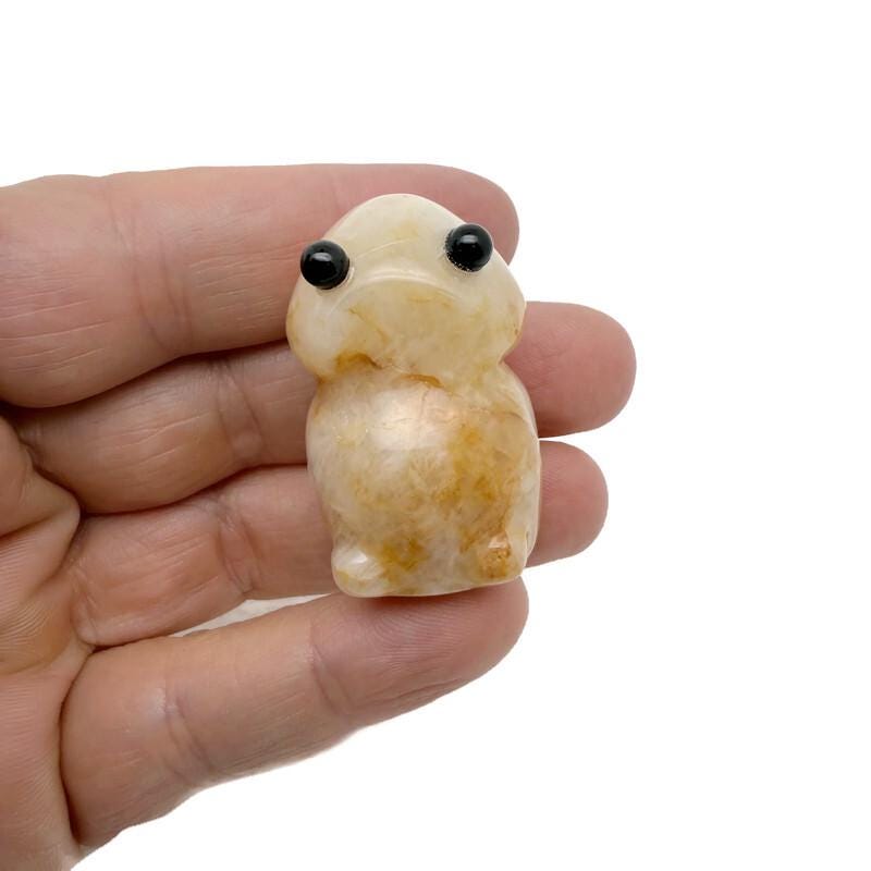 Yellow jade frog monster carving by GemstoneGO, handcrafted gemstone creature statue featuring intricate details and vibrant yellow color.