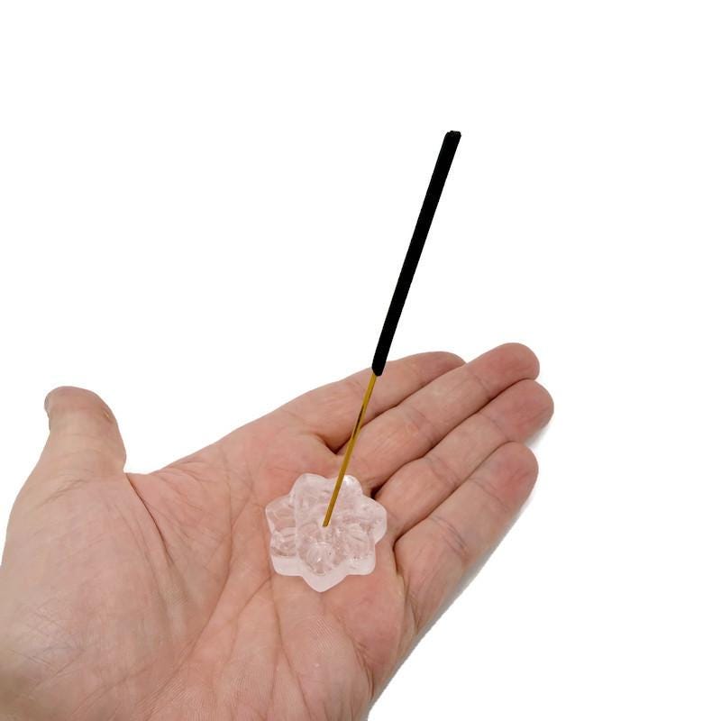 Clear quartz crystal flower incense holder with carved gemstone design for meditation and stick burning by GemstoneGO.