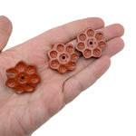 Red Jasper natural crystal flower incense holder with carved gemstone design, ideal for meditation and stick burning.