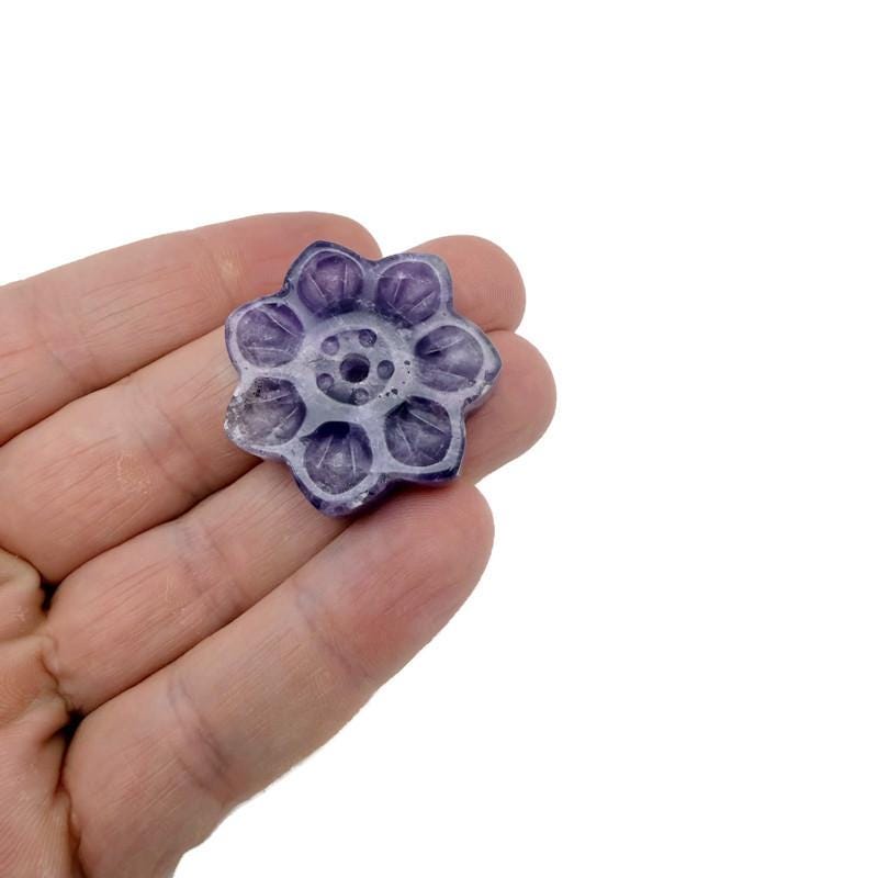 Amethyst crystal flower incense holder from GemstoneGO with carved gemstone design for meditation and stick burning.