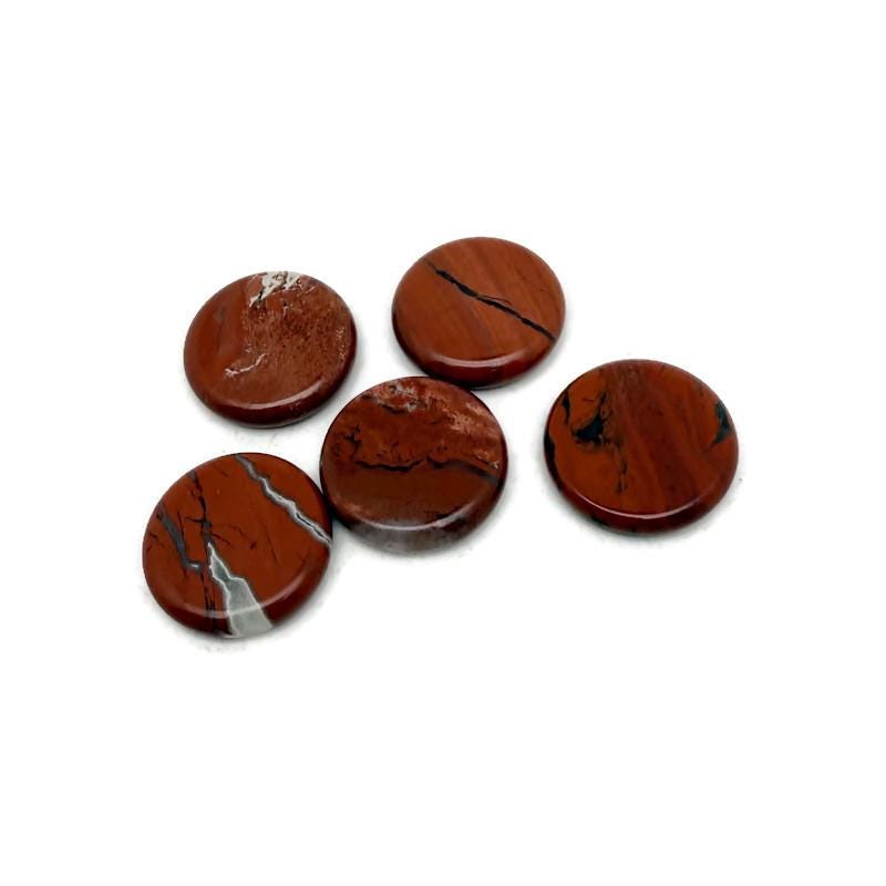 Round red jasper flat gemstone slab, 25mm, from GemstoneGO, showcasing a smooth, polished red jasper surface with natural patterns.