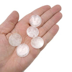 Round clear quartz flat gemstone slab, 25mm, with smooth polished surface, showcasing transparent and crystalline structure.