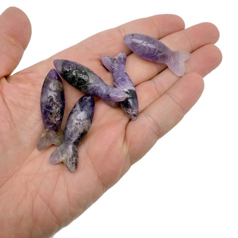 Amethyst fish-shaped gemstone pendant by GemstoneGO, featuring a lucky fishing charm design with purple amethyst stone.