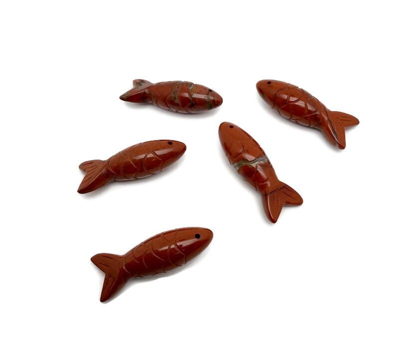 Red Jasper fish gemstone pendant featuring a fish design, perfect as a lucky fishing charm gift by GemstoneGO.