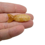 Yellow jade fish gemstone pendant from GemstoneGO, featuring a lucky fishing charm design on a silver chain.