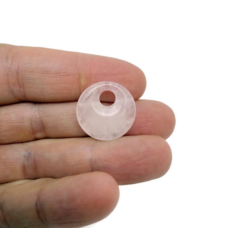 Natural crystal donut charm from GemstoneGO featuring a 20mm Pi stone in mixed colors, perfect for jewelry or crafts.