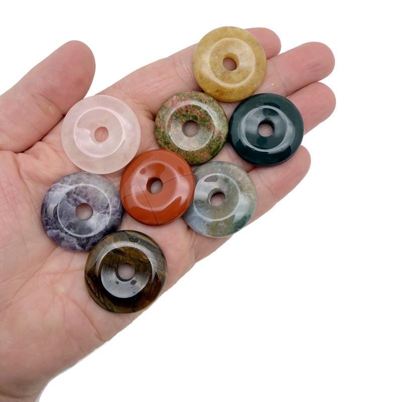Colorful 30mm crystal donut Pi stone from GemstoneGO with mixed gemstone accents, perfect for gifts and decorative display.