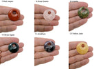 Polished 30mm Pi Stone healing crystal donut from GemstoneGO with vibrant mixed colors and smooth, polished surface.
