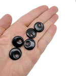 Obsidian crystal donut pendant with 20mm Pi stone from GemstoneGO, featuring a smooth black polished surface and rounded shape.