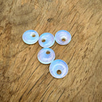 Opalite crystal donut pendant, 20mm Pi stone from GemstoneGO, showcasing a smooth, oval-shaped gemstone with a luminous, iridescent glow.