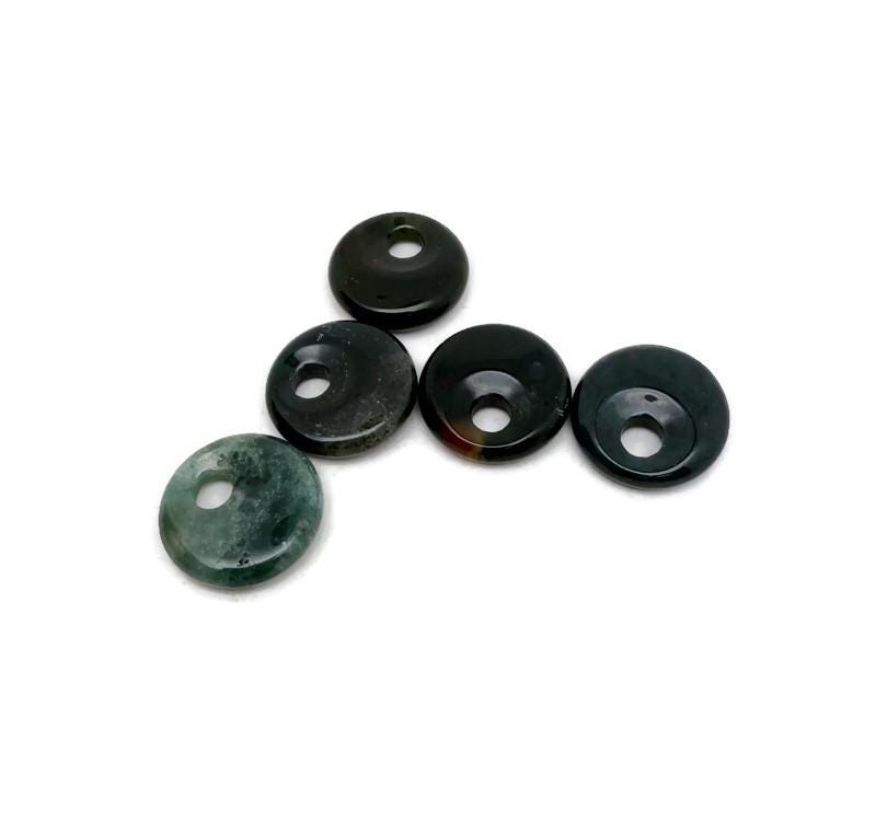 Moss Agate crystal donut pendant from GemstoneGO, 20mm Pi stone with green and brown moss patterns on polished gemstone.