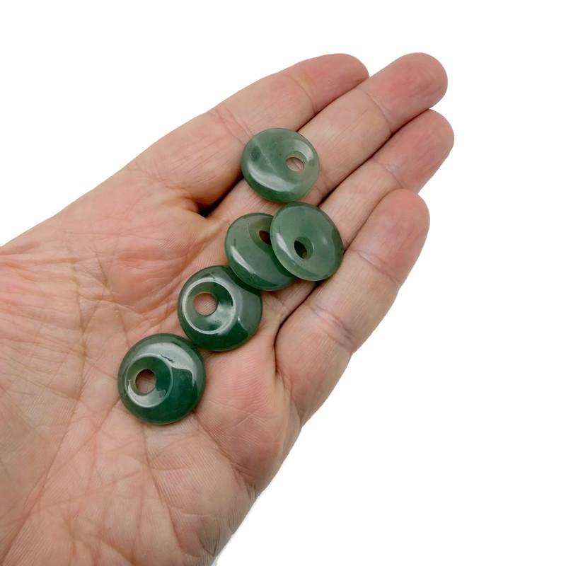 A 20mm aventurine crystal donut pendant, featuring a polished green gemstone with natural patterns, from GemstoneGO.