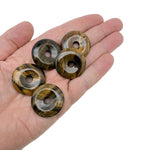Polished 30mm Tiger Eye crystal donut pendant with natural golden-brown banding from GemstoneGO.