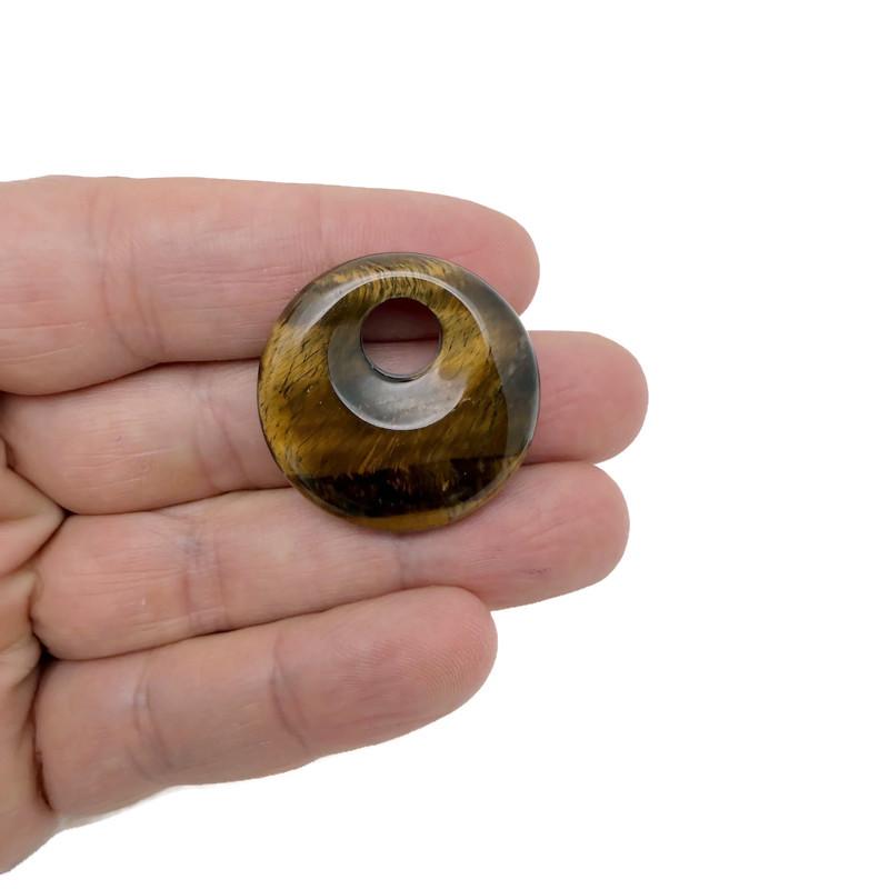 Tiger Eye Crystal Donut gemstone from GemstoneGO, 30mm Pi Stone with rich golden-brown chatoyancy and smooth polished surface.
