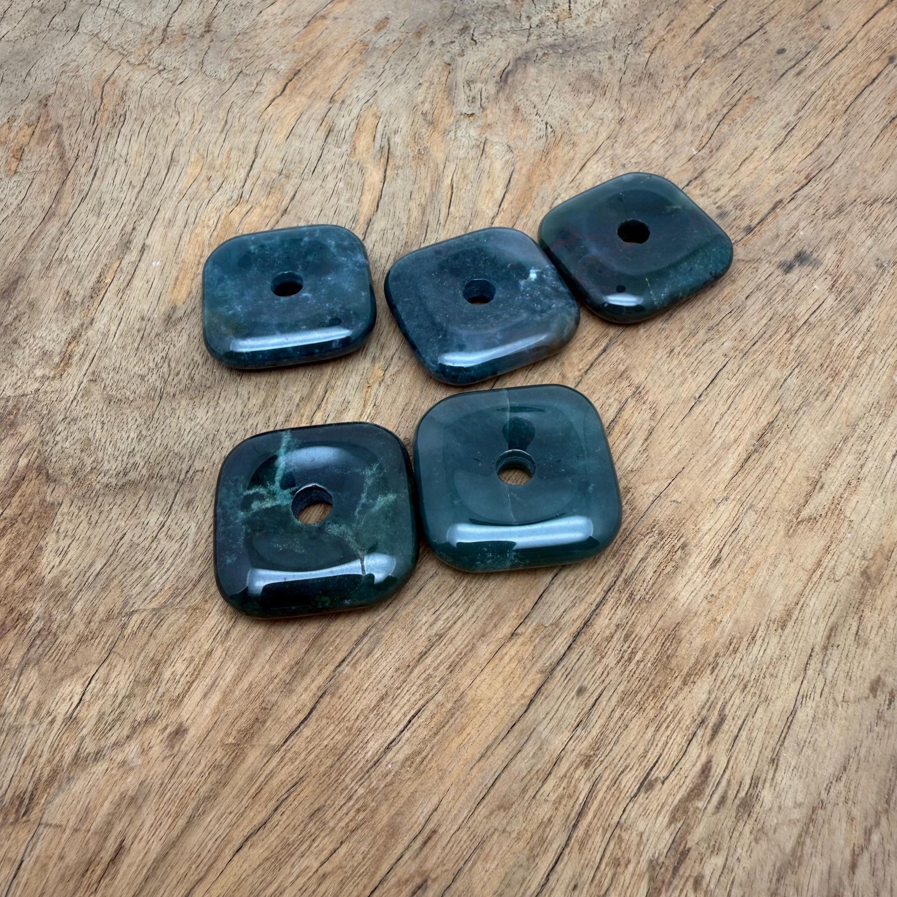 Square moss agate crystal donut pendant, 30mm Pi stone with intricate green and brown natural gemstone patterns.