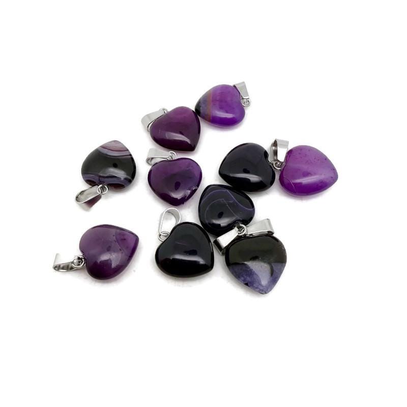 Purple agate heart pendant by GemstoneGO featuring a mini crystal design, showcasing a polished purple stone heart pendant.