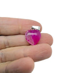 Pink agate heart pendant necklace featuring a mini crystal charm from GemstoneGO, showcasing a polished pink agate stone and silver chain.