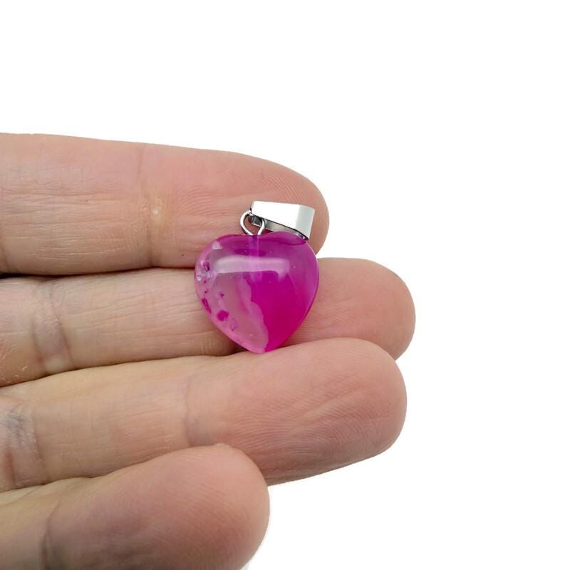 Pink agate heart pendant necklace featuring a mini crystal charm from GemstoneGO, showcasing a polished pink agate stone and silver chain.