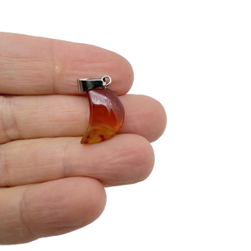 Carnelian moon pendant with crystal details from GemstoneGO, ideal for jewelry making and crystal healing accessories.