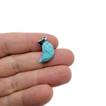 Turquoise Moon synthetic pendant from GemstoneGO, featuring a round moon-shaped jewelry making supply with vibrant turquoise color.
