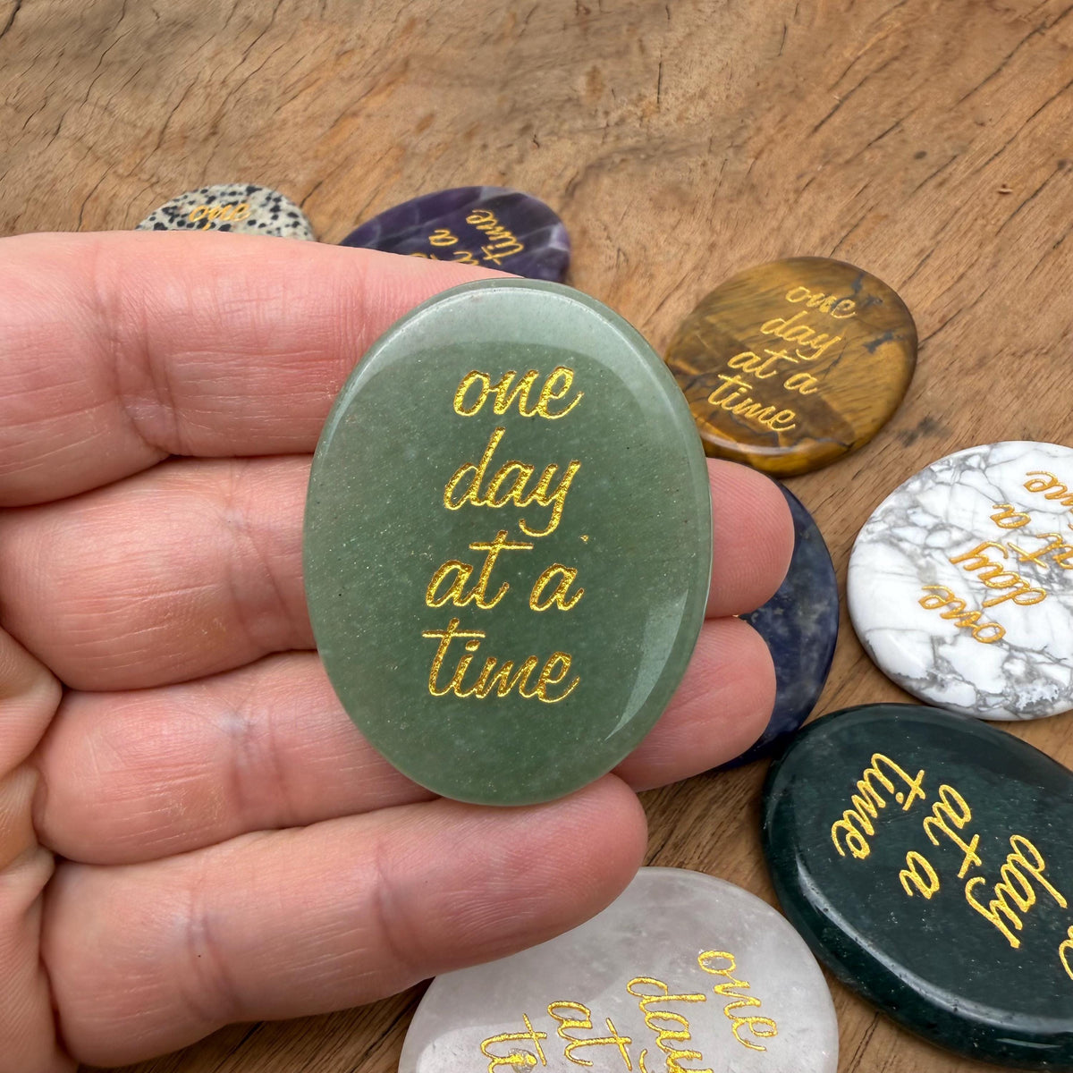 Engraved crystal with "One Day at a Time" inspirational message by GemstoneGO, featuring clear, polished glass with engraved text.