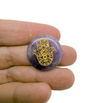 Engraved Hamsa Hand crystal from GemstoneGO, featuring intricate designs for protection, luck, and spiritual energy.