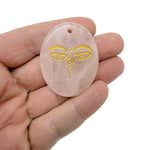 Crystal Buddha Eyes engraved amulet by GemstoneGO, featuring drilled spiritual symbols for insight and guidance.