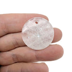 Engraved crystal compass pendant with drilled hole, designed as a traveler gift from GemstoneGO, showcasing detailed craftsmanship.