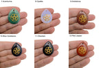 Pentagram engraved crystal from GemstoneGO, drilled pagan protection and balance stone on a white background.
