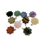Snowflake gemstone pendant featuring a healing stone from GemstoneGO, showcasing a delicate snowflake design and vibrant mixed gemstones.